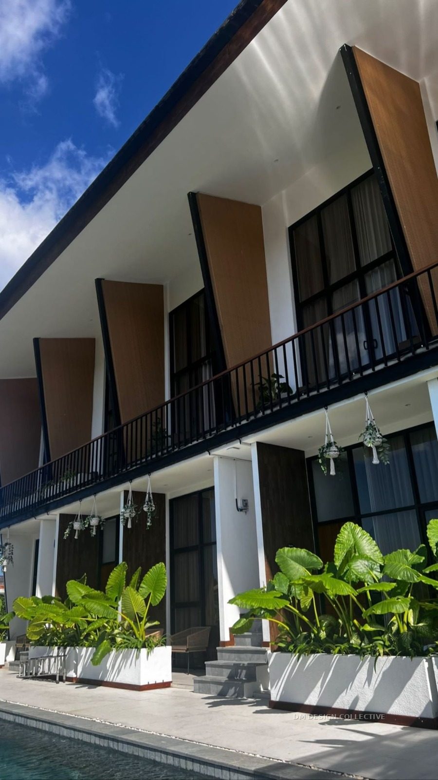 Completed DM Design Collective rooming accommodation project — balcony detail with landscaped courtyard